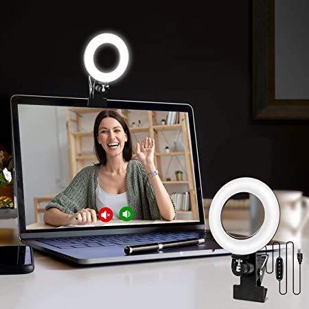 Cette lampe annulaire de 11,5 cm est destinée aux vidéoconférences d'une seule personne - Zoom, réunions, etc. Elle se fixe à votre écran de bureau ou au bord supérieur de votre ordinateur portable.