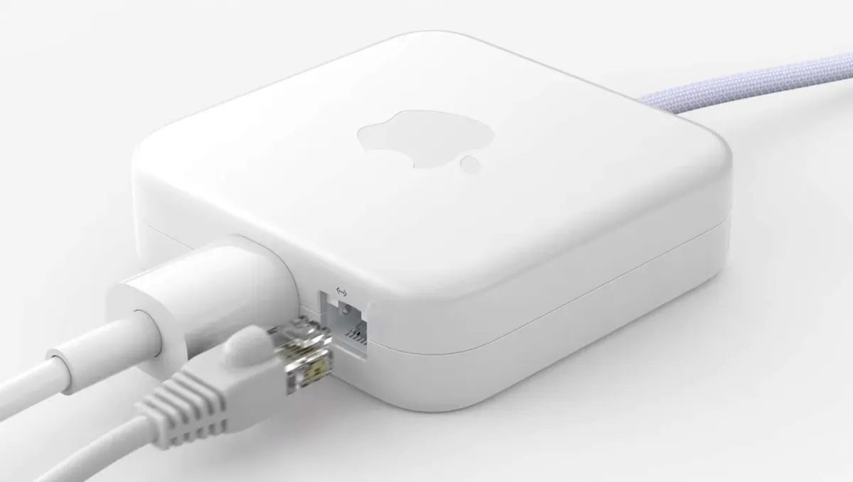 Le câble d'alimentation de l'iMac alimenté par M1 de 24 pouces est doté d'un adaptateur secteur intégré avec un port Ethernet inclus.